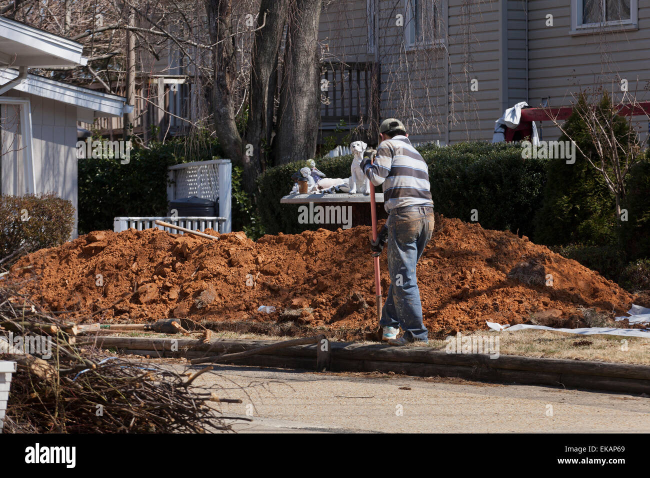 Man digging dirt - USA Stock Photo