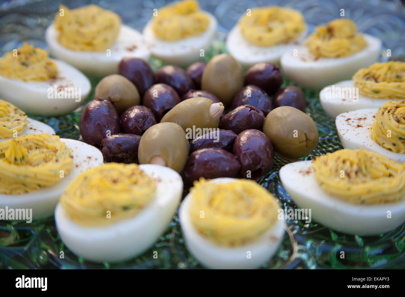 Marinated Kalamata olives and green olives stuffed with garlic served