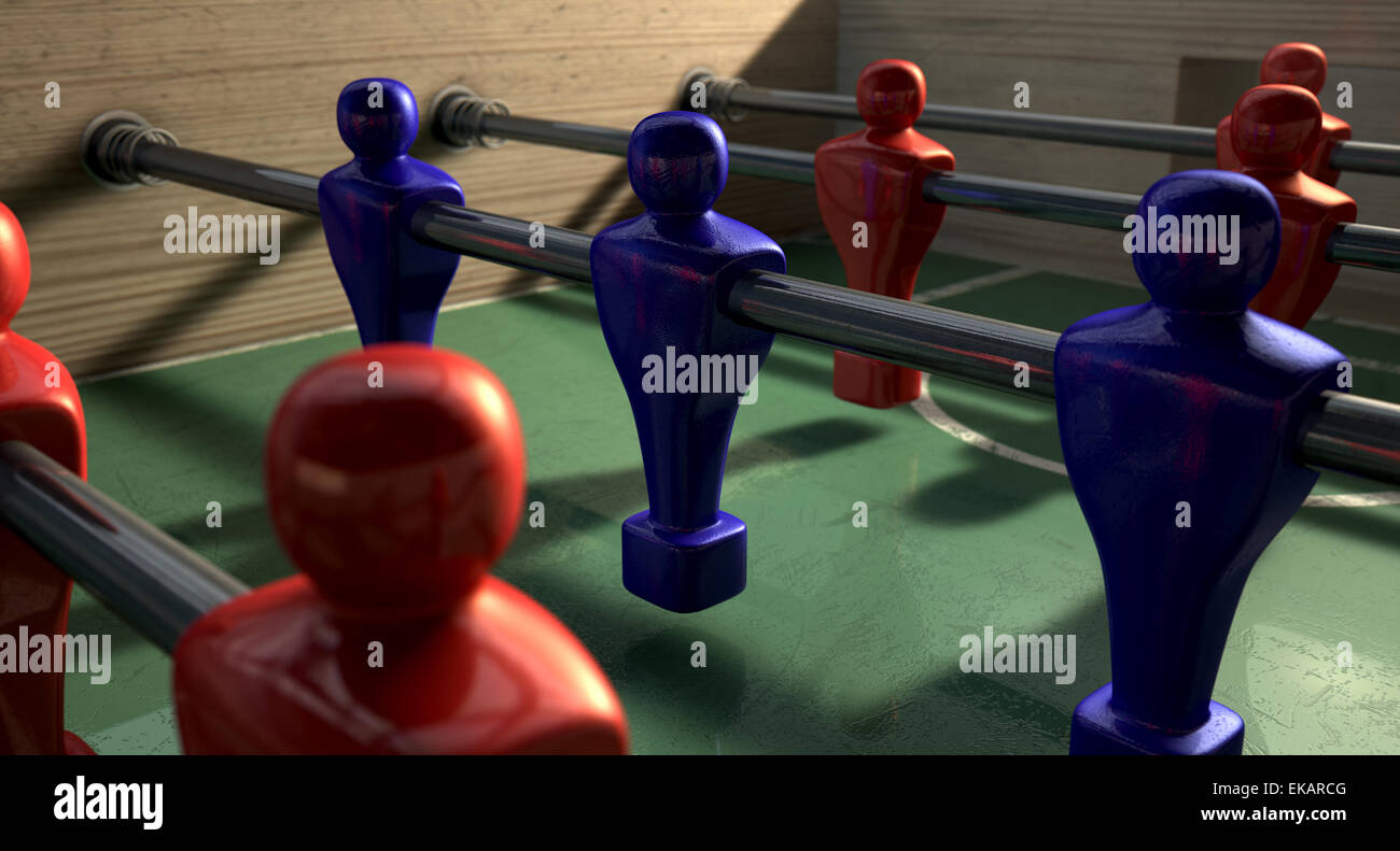 One half of a foosball table at ground level with a soccer ball in