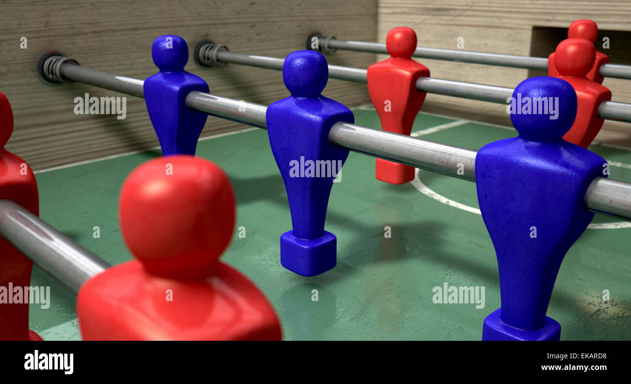 One half of a foosball table at ground level with a soccer ball in
