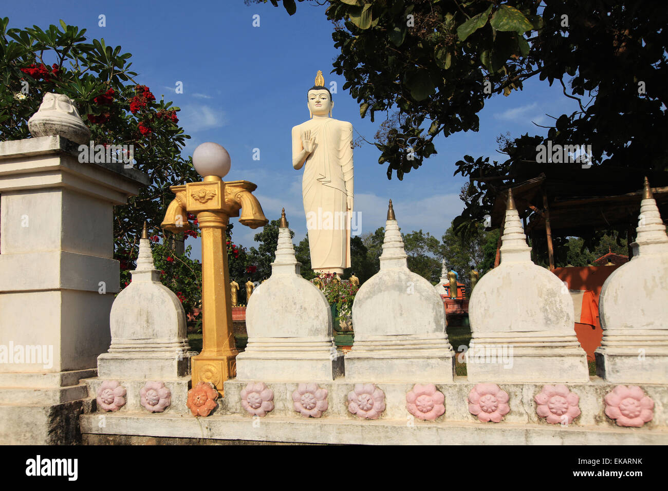 Tallest Statue of Buddha with golden statues in Sri Lanka Stock Photo