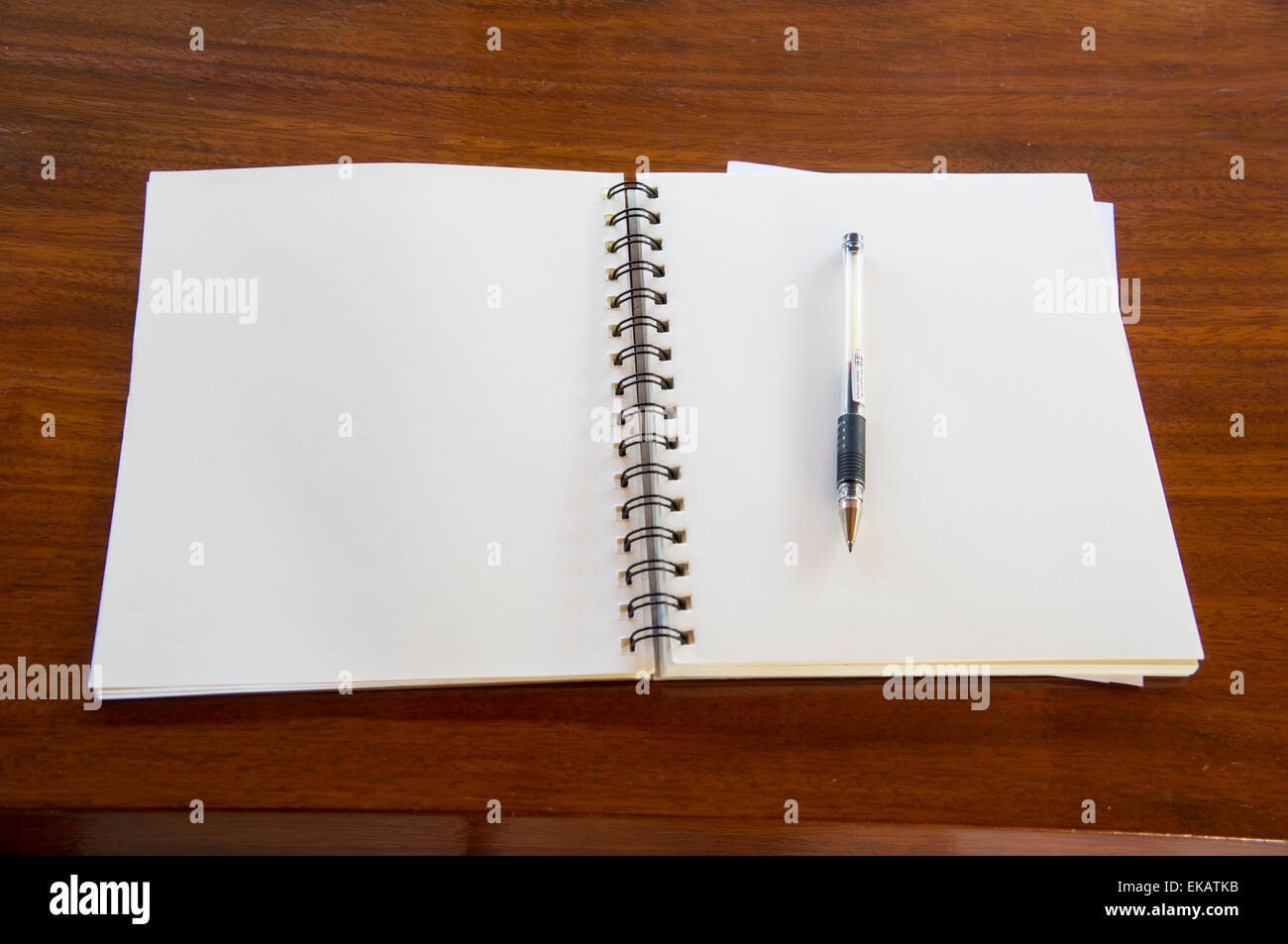 man working table book pen booklet top Stock Photo Alamy