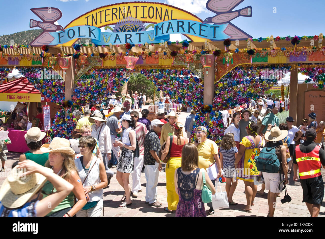 The main entrance to the Santa Fe International Folk Art Market held each July is a colorful and busy spot. Stock Photo
