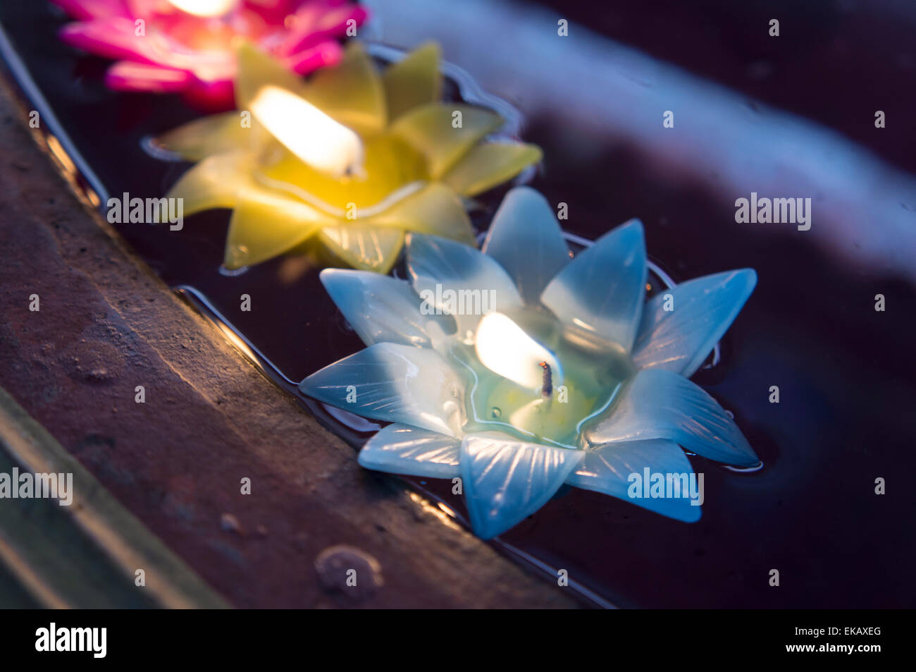 candle worship light bright water colorful color Stock Photo
