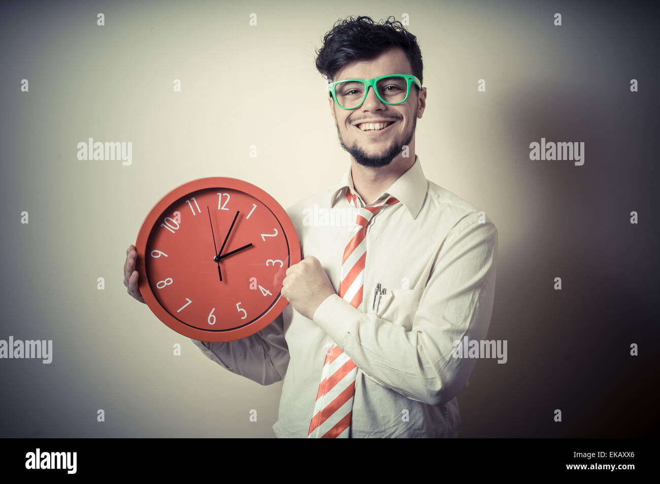 funny businessman with wall clock Stock Photo