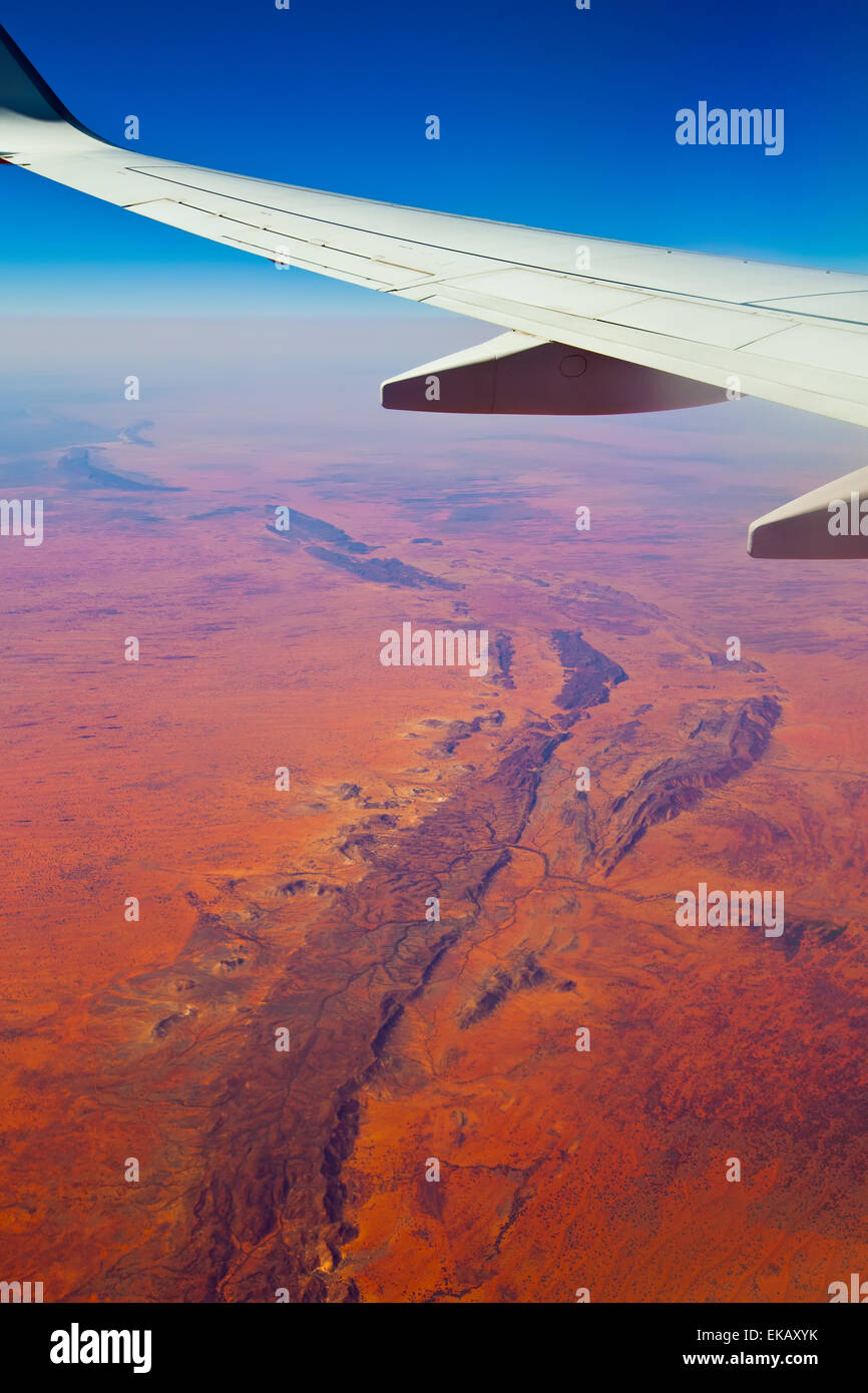 Wing tip of a passenger jet flying over Central Australia Stock Photo