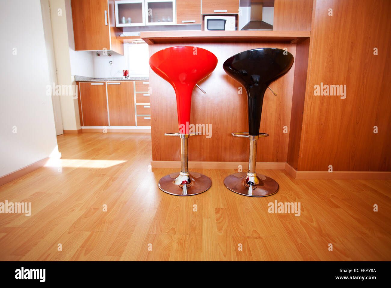 kitchen interior with bar chairs in the apartment Stock Photo Alamy