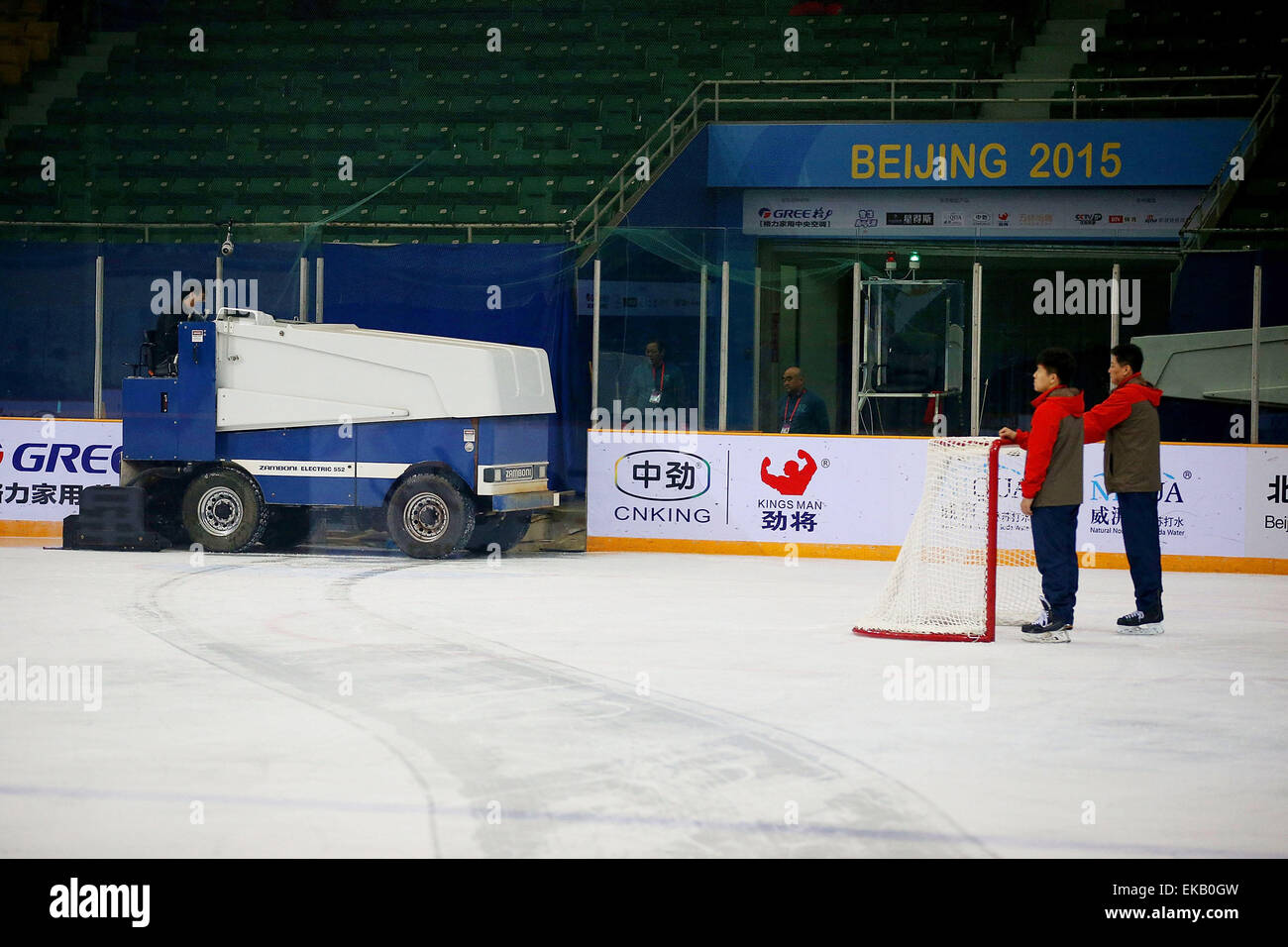 (150409) -- BEIJING, April 9, 2015 -- Staff clean the rink during the match between Slovakia and the Democratic People's Republic of Korea at the 2015 IIHF Women's World Championship division 1 group B at the Capital Gymnasium in Beijing, capital of China, on April 9, 2015. (Xinhua/Li Ming) Stock Photo