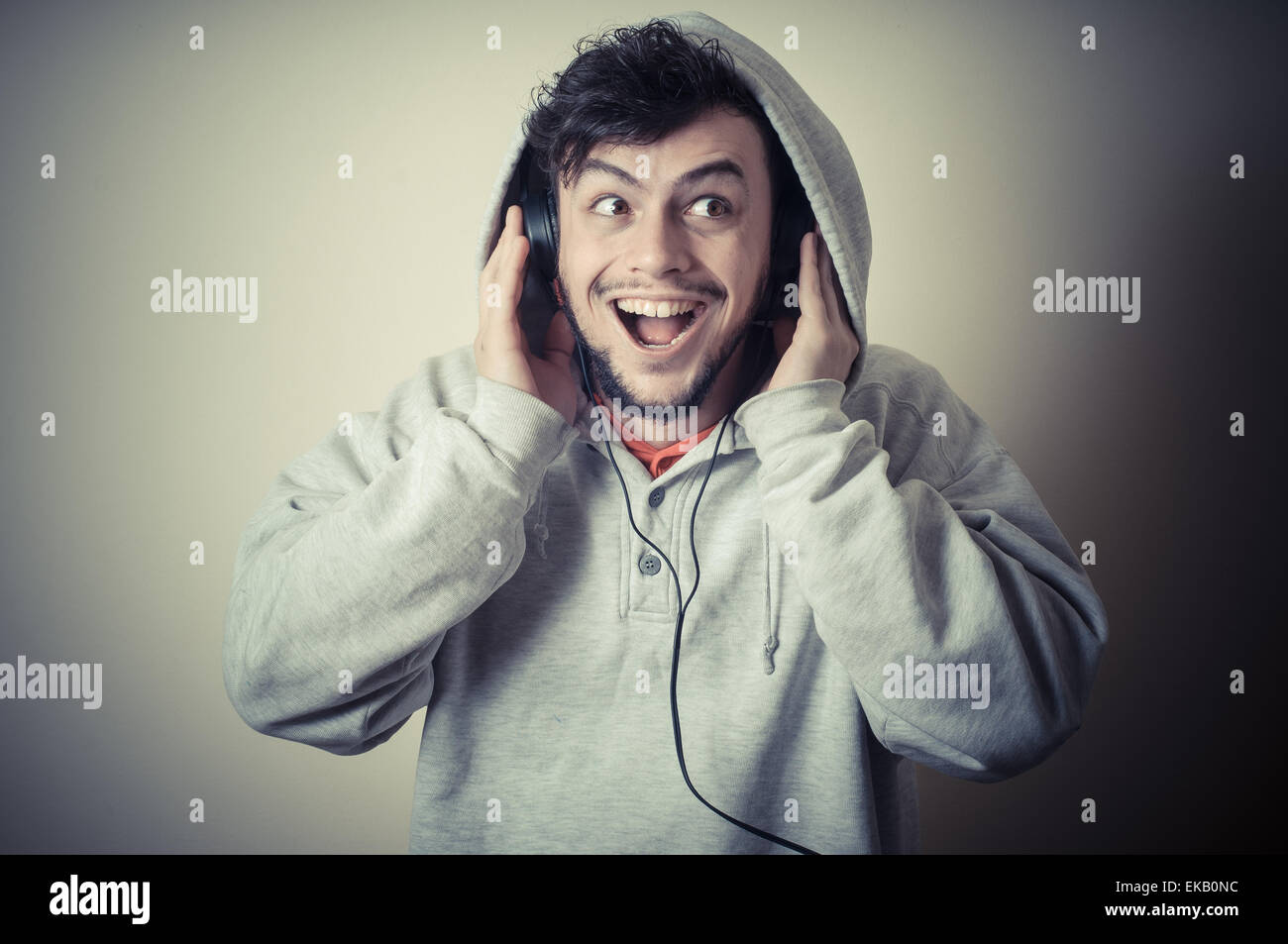 boy with sweatshirt and headphones Stock Photo Alamy
