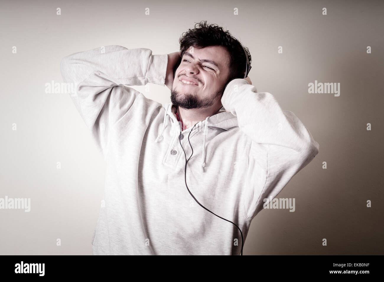 boy with sweatshirt and headphones Stock Photo Alamy