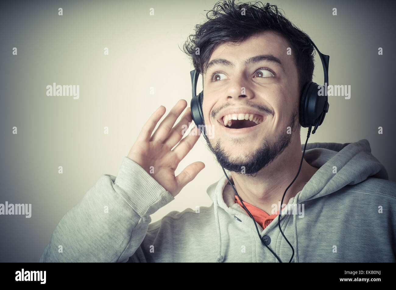 boy with sweatshirt and headphones Stock Photo Alamy