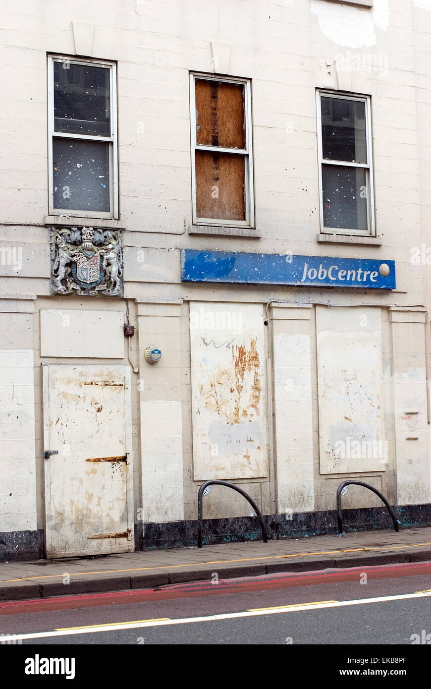 Job Centre Office Closed And Boarded Up Doors And Window