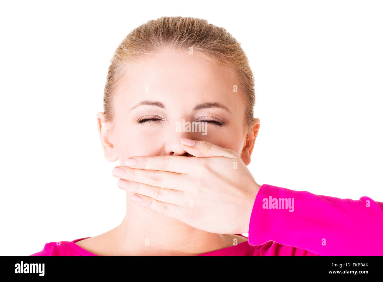 Young woman covering her mouth Stock Photo - Alamy