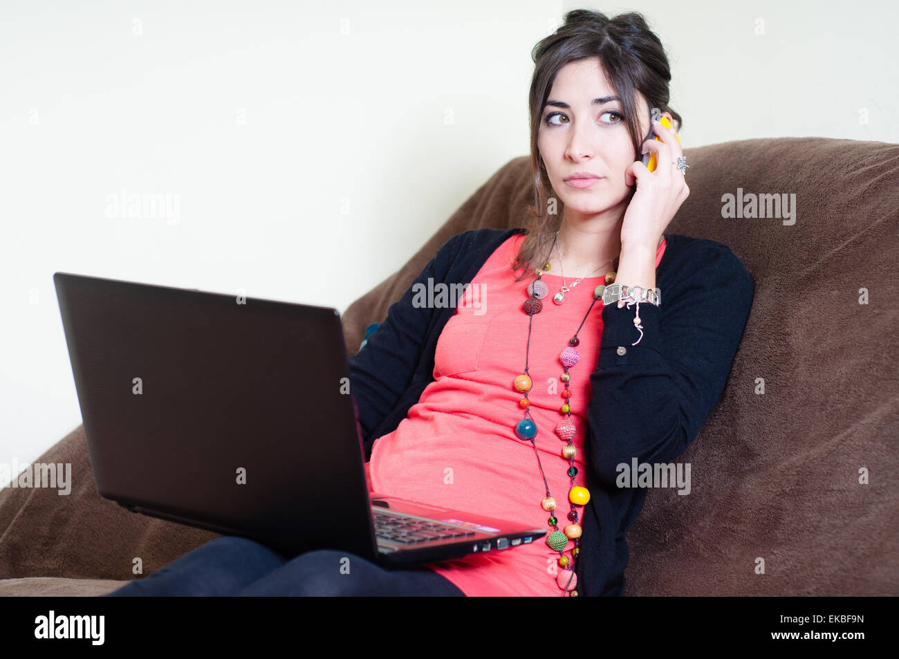 woman at home using notebook Stock Photo - Alamy