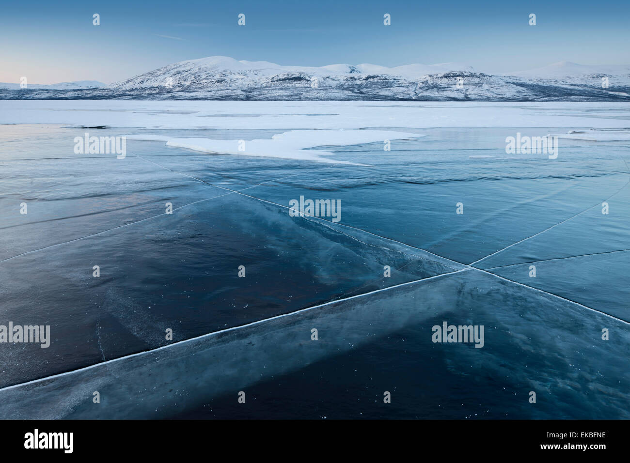 A frozen lake, so clear its possible to see through the ice, near Absiko, Sweden, Scandinavia, Europe Stock Photo