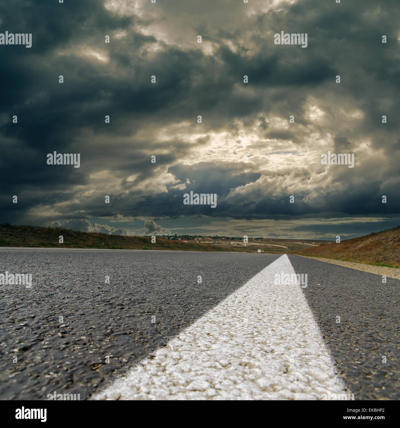 dramatic sky over asphalt road Stock Photo - Alamy