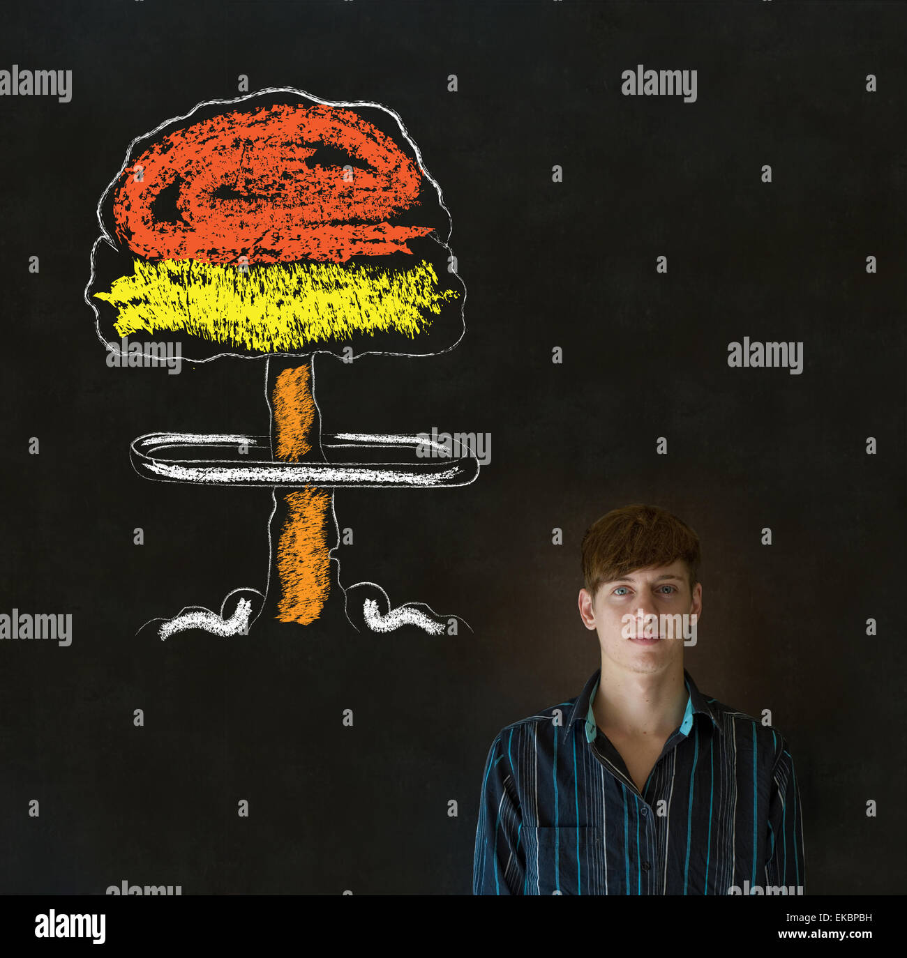Man thinking chalk nuclear bomb cloud blackboard background Stock Photo