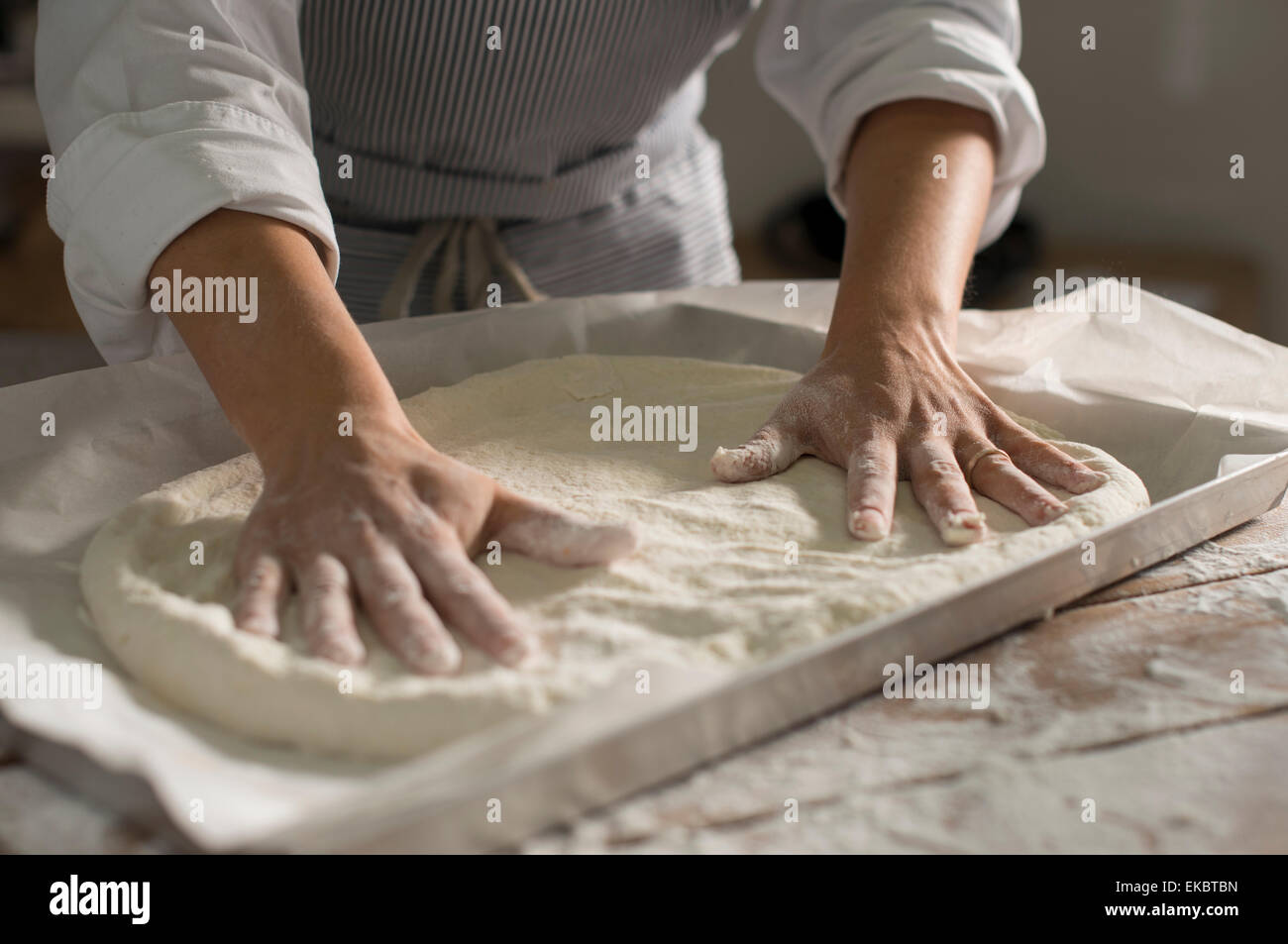 Baker preparing gluten-free dough for baking Stock Photo