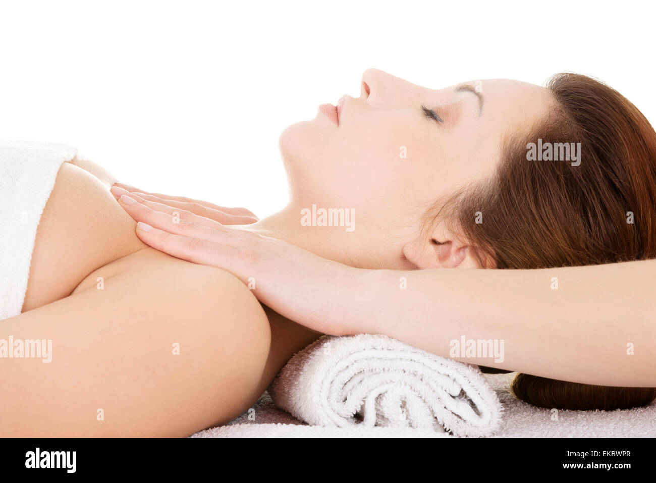 Attractive  woman relaxing beeing massaged Stock Photo