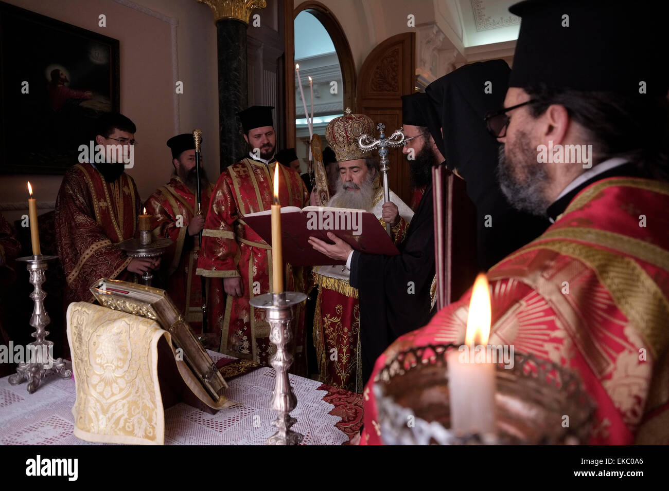 Jerusalem, Israel 9th April 2015: Greek Orthodox Patriarch of Jerusalem Theophilos III praying at the Greek Orthodox Patriarchate church soon after the 'Washing of the Feet' ceremony at the Church of the Holy Sepulchre in the old city of Jerusalem on April 09, 2015, Christians around the world commemorate events around the crucifixion of Jesus Christ, leading up to his resurrection on Easter. Credit:  Eddie Gerald/Alamy Live News Stock Photo