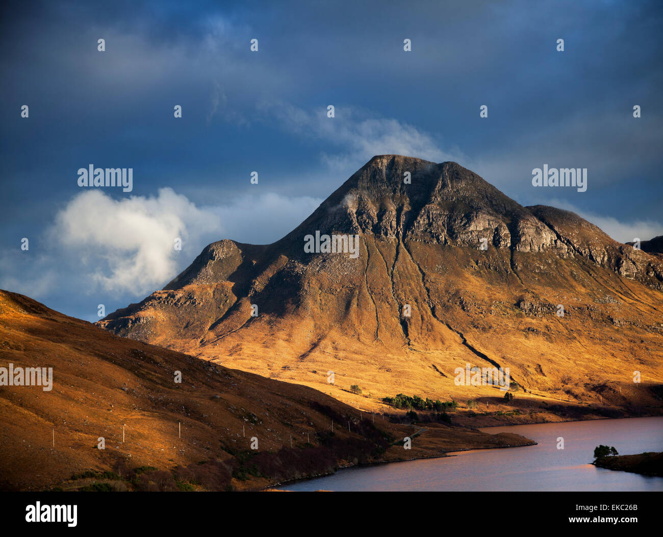 Mountain loch and dramatic sky, Assynt, North West Highlands, Scotland, UK Stock Photo