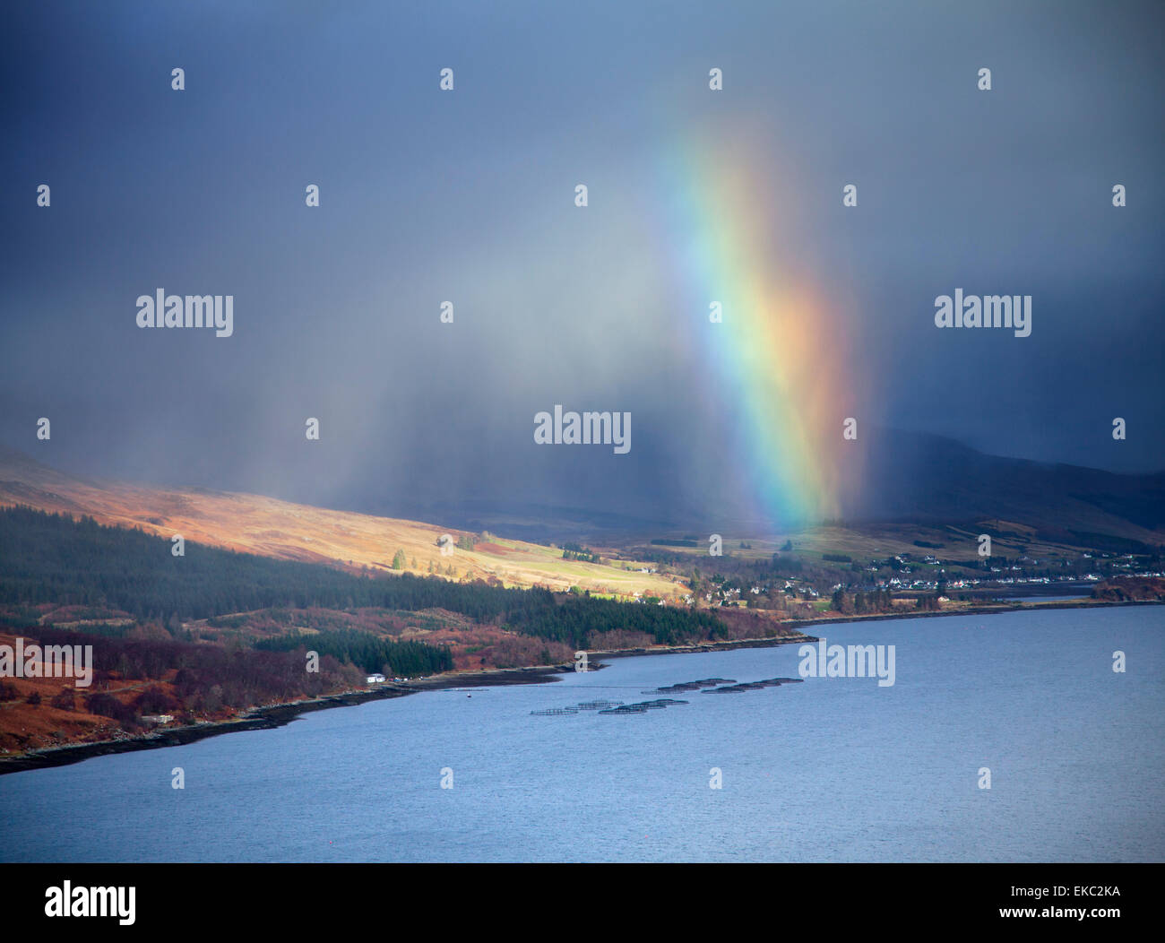 Rainbow over loch, Assynt, Scotland, UK Stock Photo