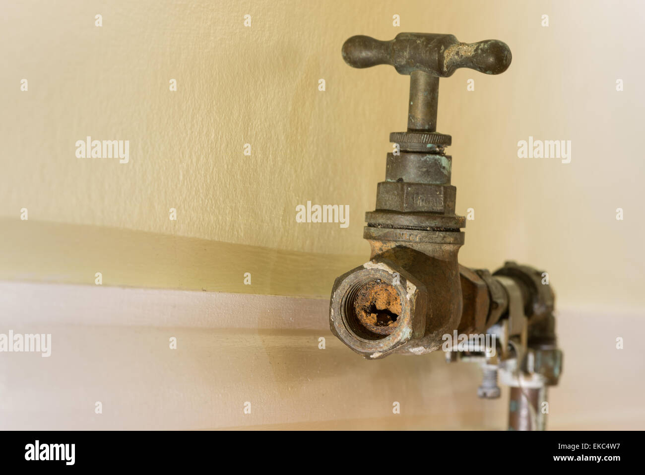 Cause of blocked mains stop cock hard water calcium carbonate deposits and rust from steel pipes