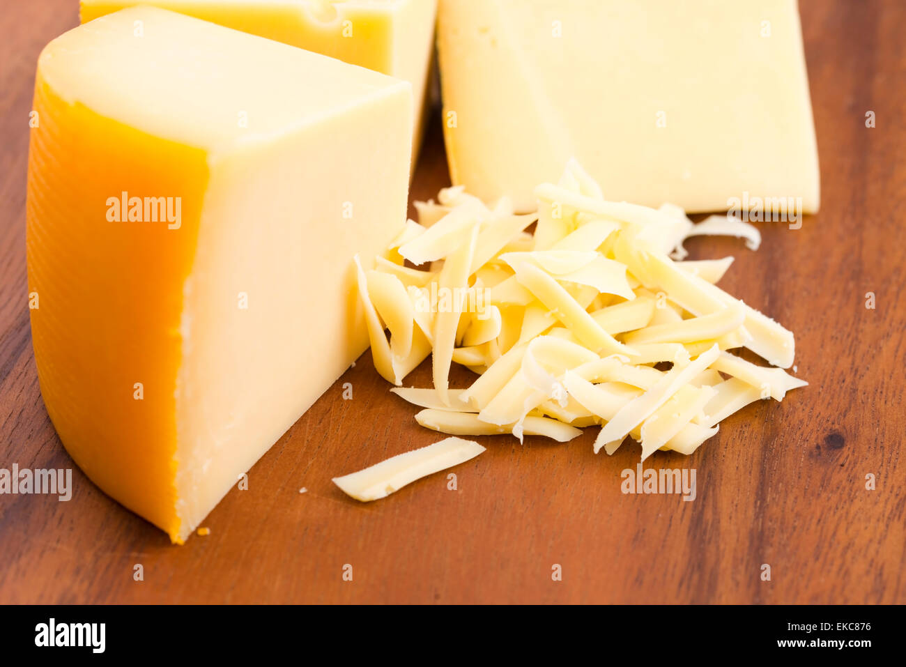 Grated cheddar cheese with block hi-res stock photography and images ...