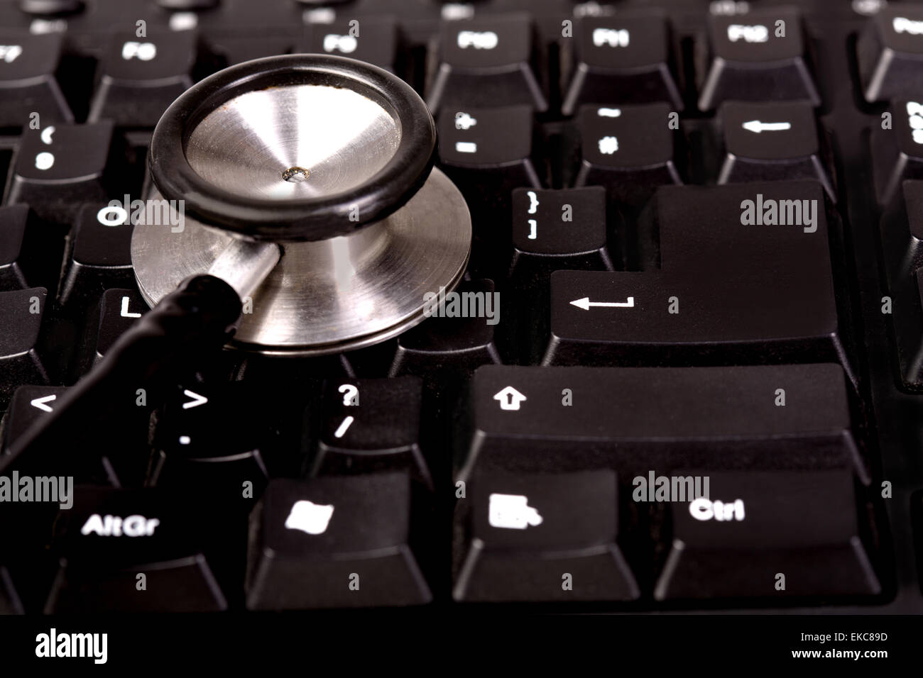 Stethoscope and computer keyboard Stock Photo - Alamy