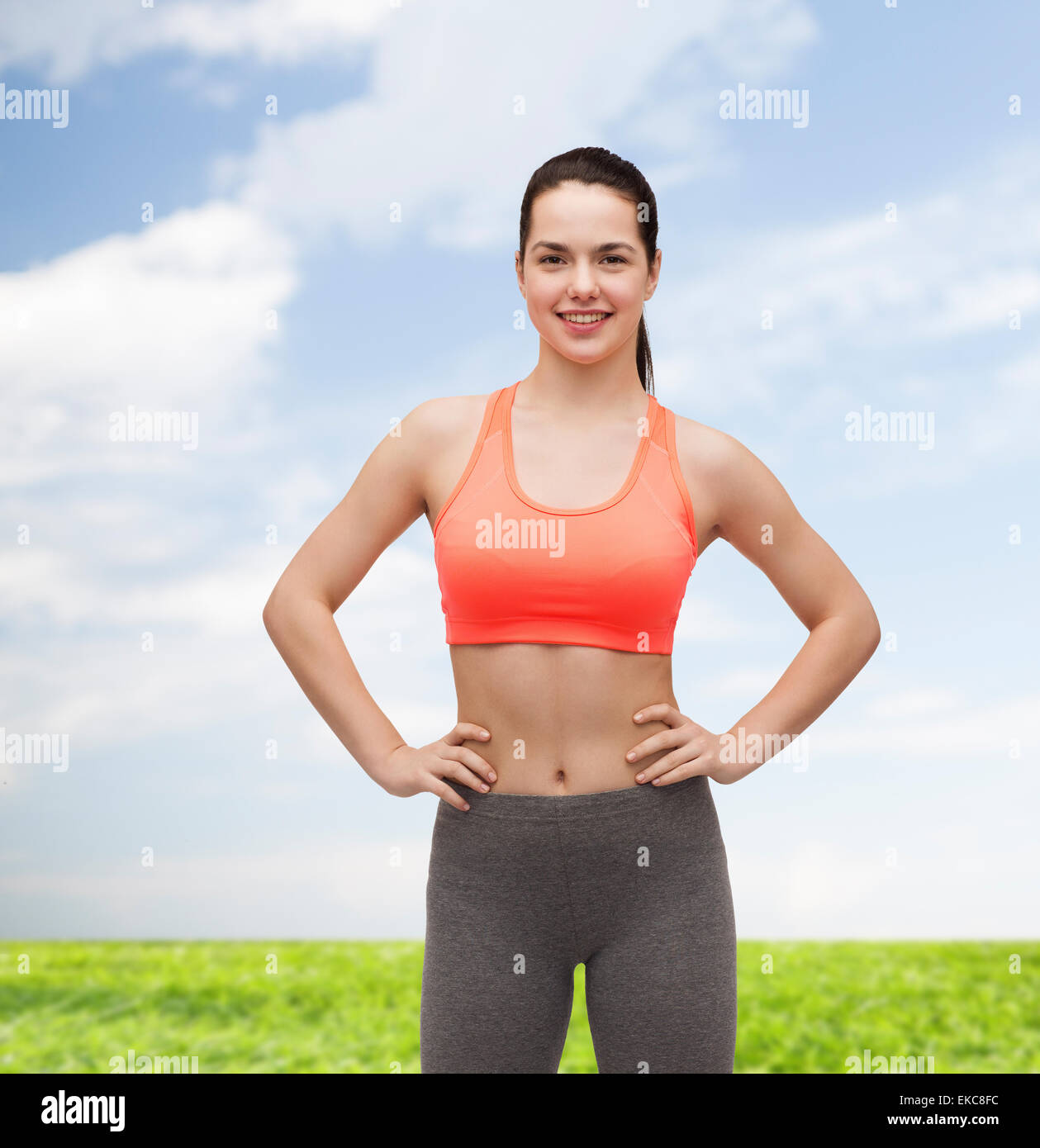 smiling teenage girl in sportswear Stock Photo