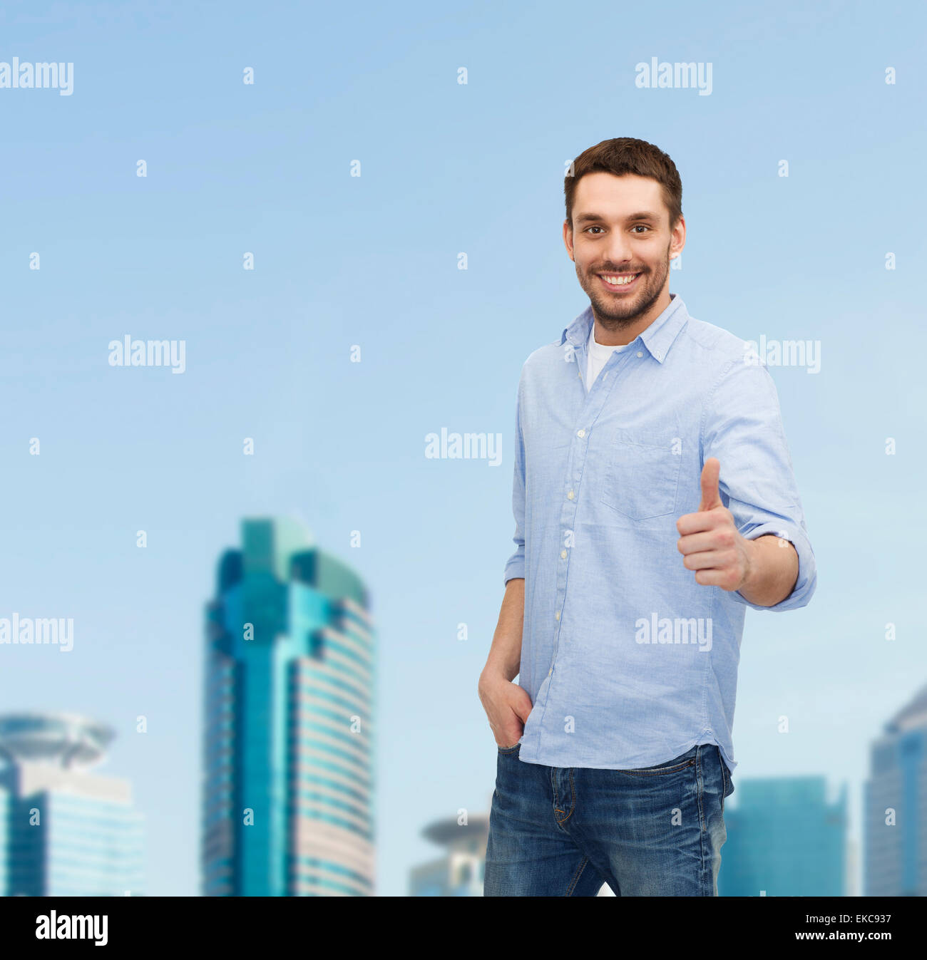 Smiling guy showing thumbs up hi-res stock photography and images - Alamy