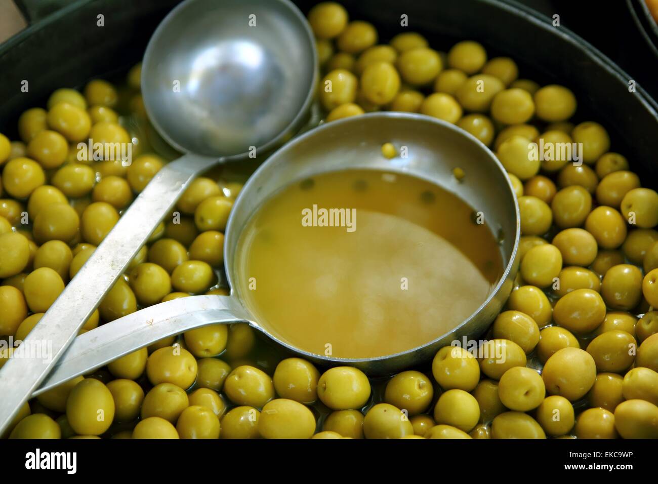 olives in pickling brine background texture Stock Photo Alamy