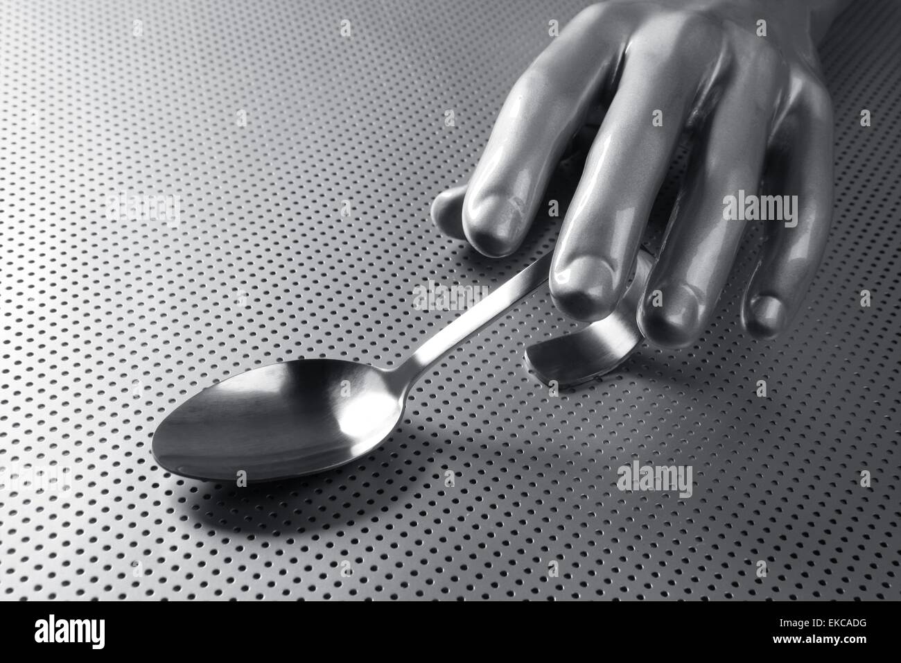 gray silver hand and spoon futuristic food Stock Photo - Alamy
