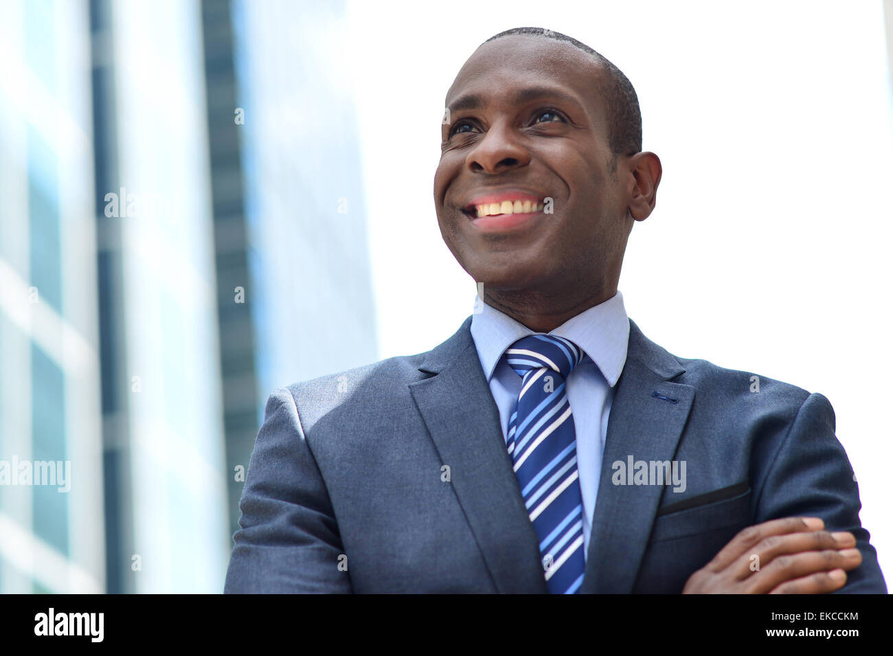 Smiling black businessman at outdoors Stock Photo - Alamy