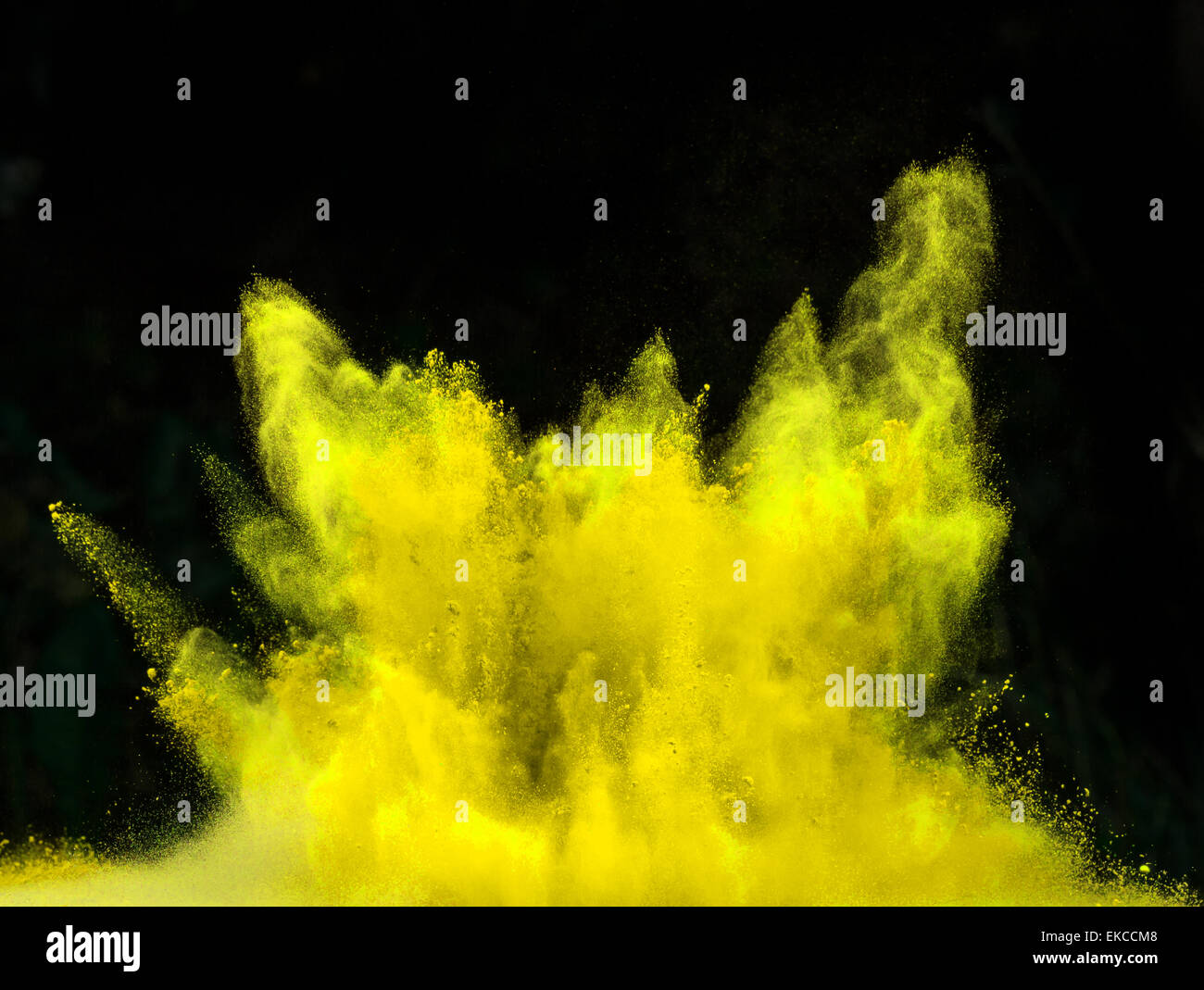 Launched colorful powder, isolated on black background Stock Photo - Alamy