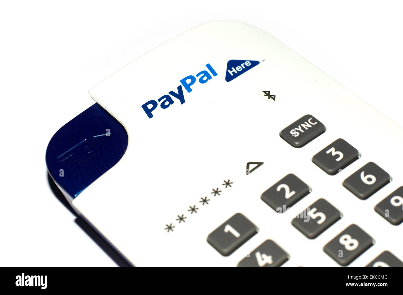PayPal Here mobile bluetooth card reader on white background. Allows