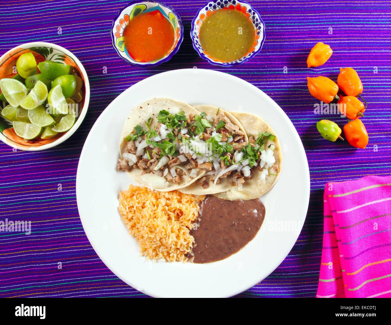 tacos de puerco pork taco with chili sauces Stock Photo Alamy