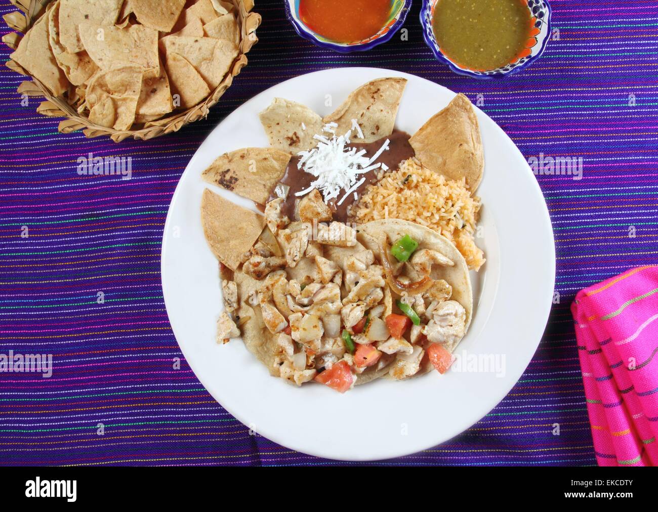 Chicken tacos Mexican style chili sauce and nachos Stock Photo Alamy