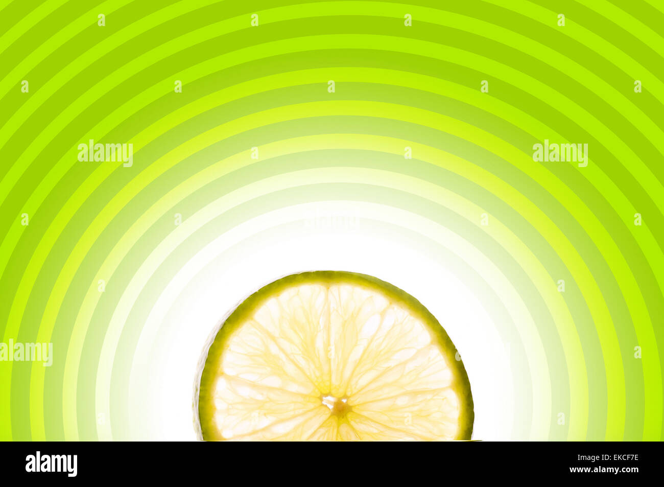 Lime slice on abstract background Stock Photo - Alamy