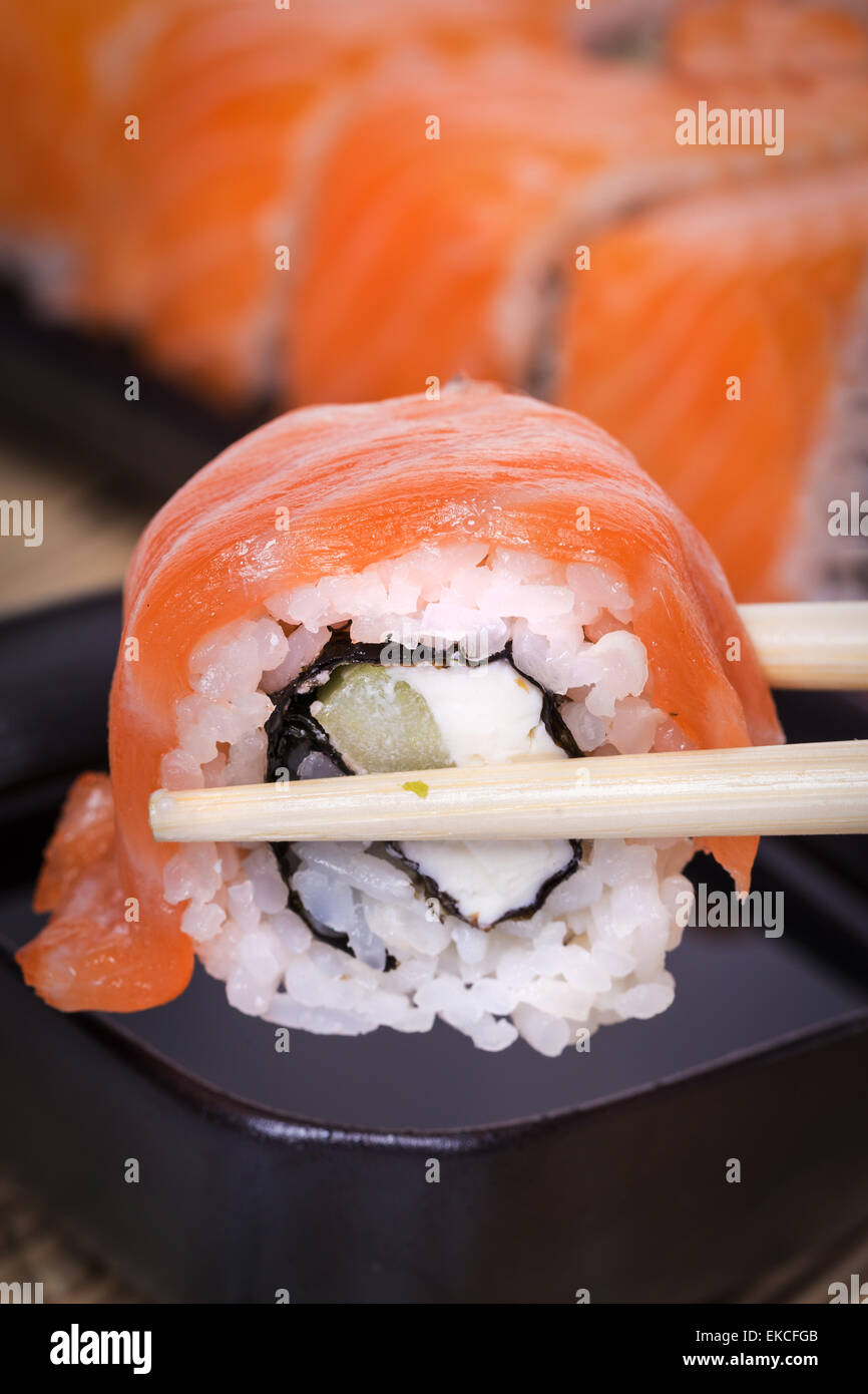 Salmon sushi maki roll Stock Photo - Alamy