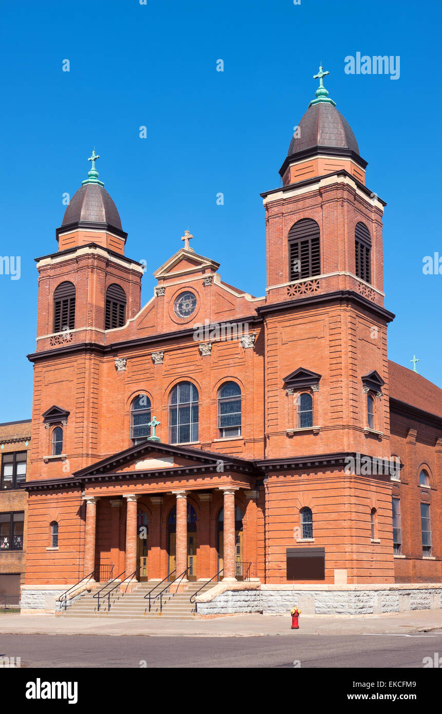 Red brick church exterior facade and stairs of beaux arts architectural style in saint paul minnesota Stock Photo