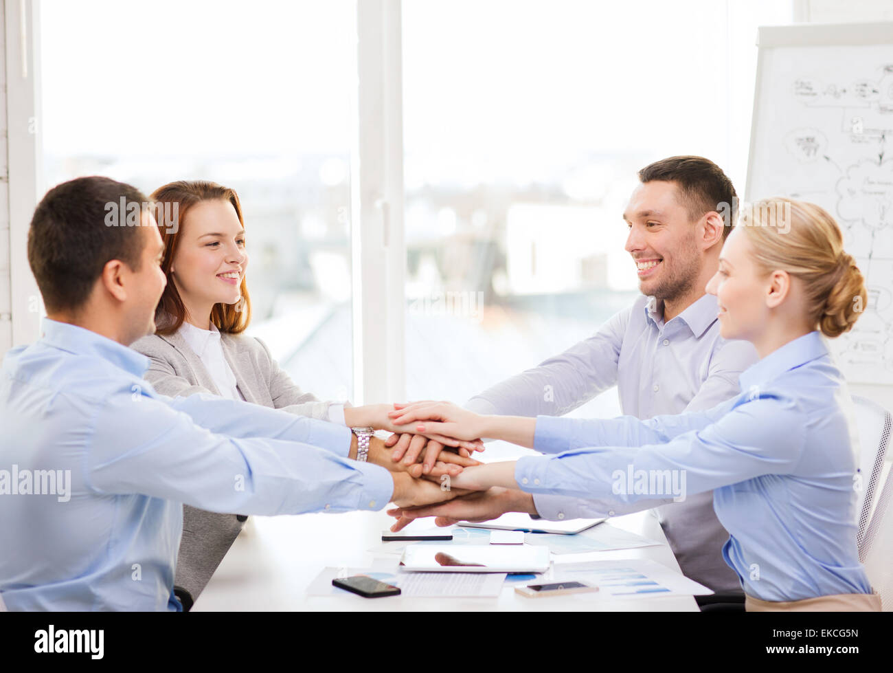 business team celebrating victory in office Stock Photo - Alamy