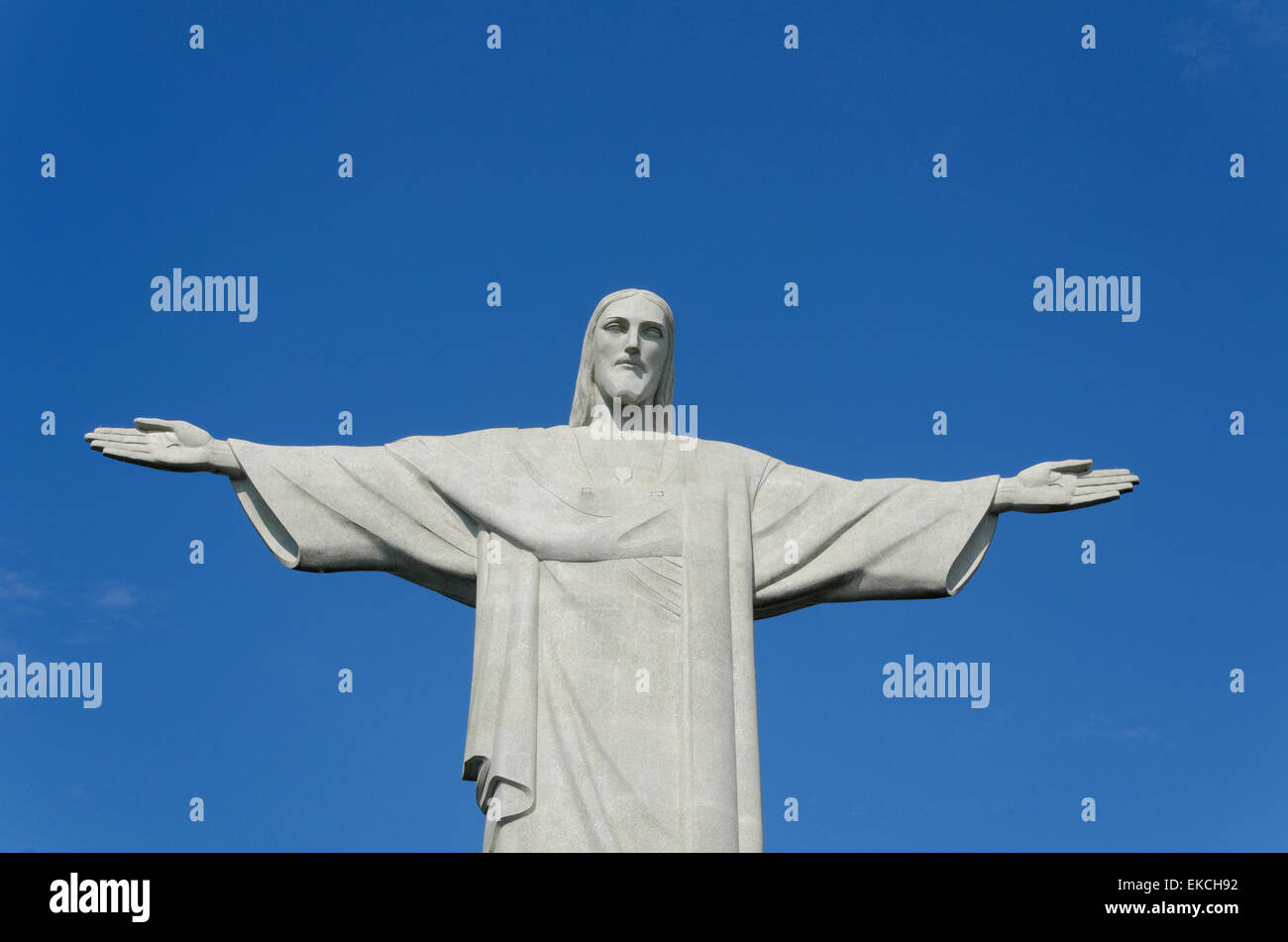 The outstretched arms of the statue of Christ the Redeemer on top of the Corcovado mountain. Rio de Janeiro, Brazil. Stock Photo