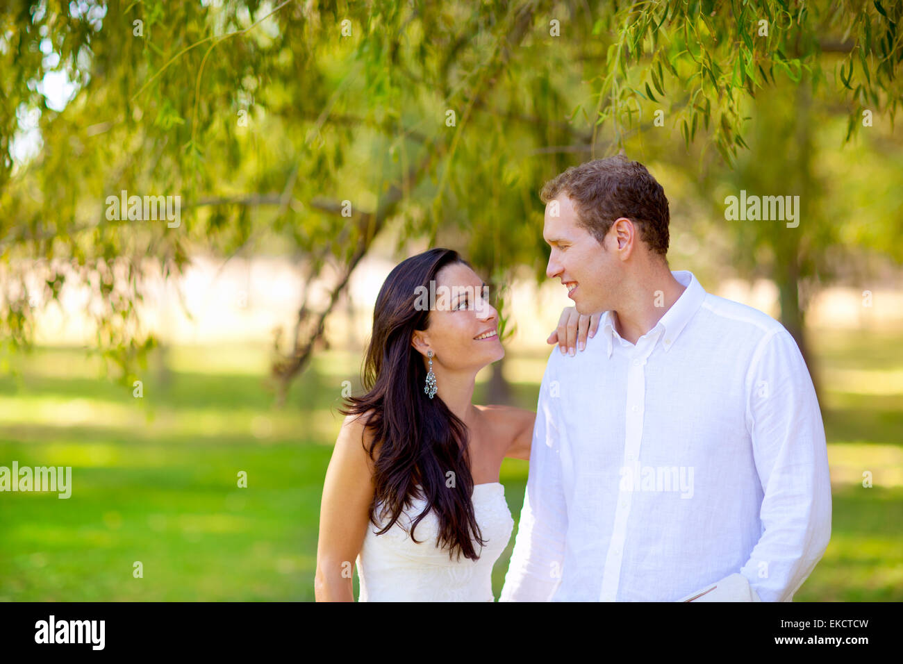 couple in love happy in green park outdoor Stock Photo - Alamy