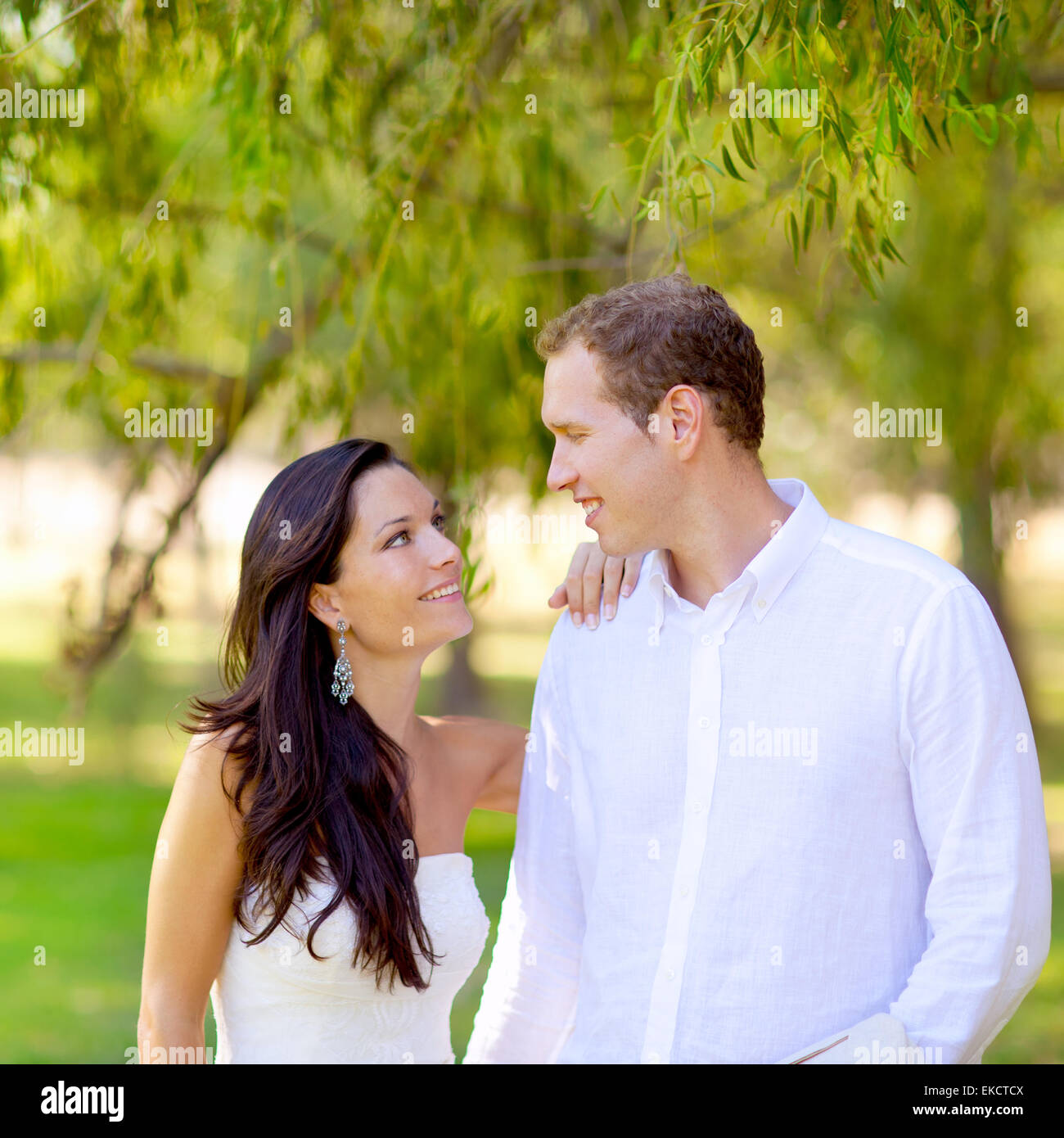 couple in love happy in green park outdoor Stock Photo - Alamy