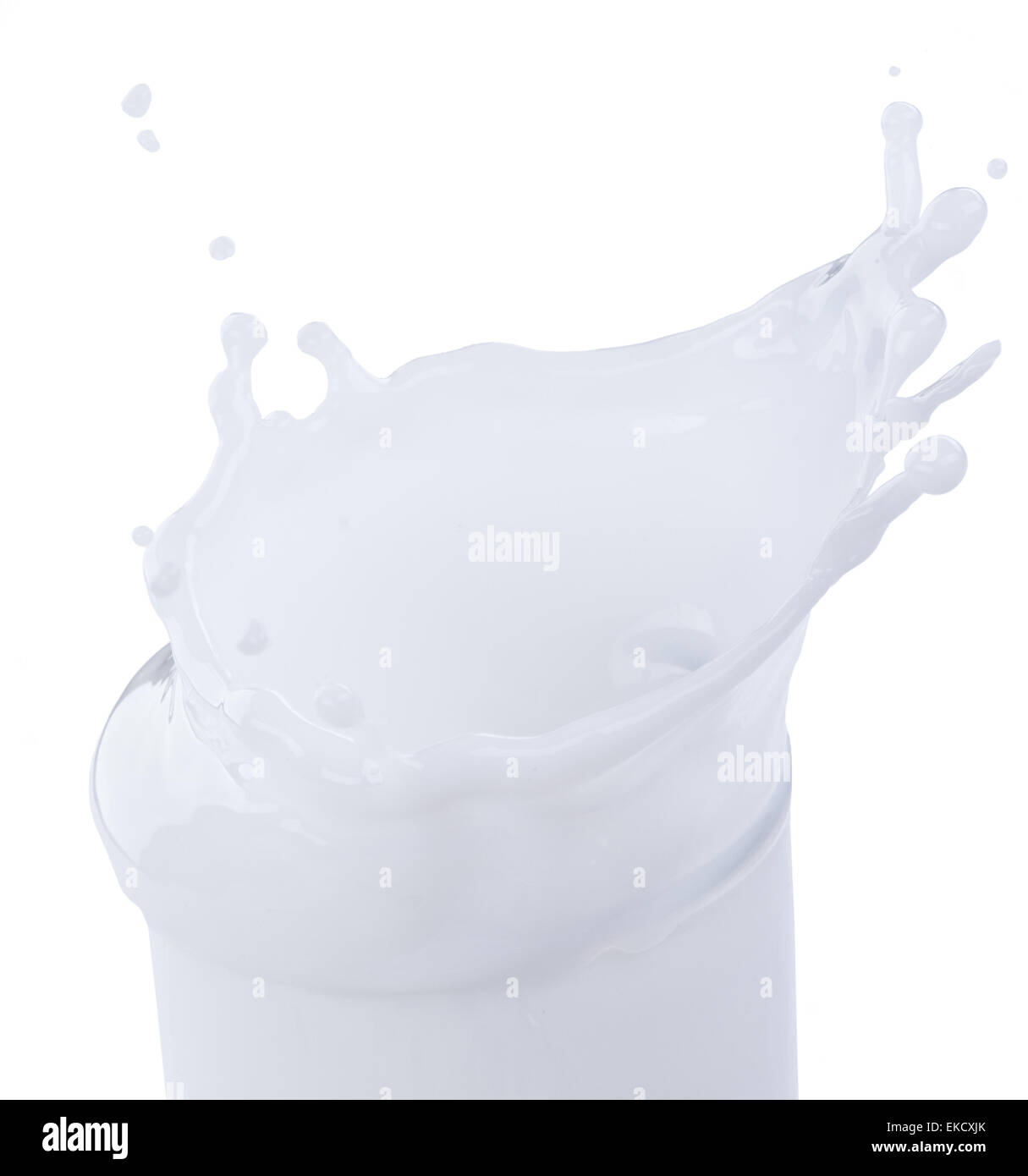 Pouring milk splash on white background Stock Photo - Alamy