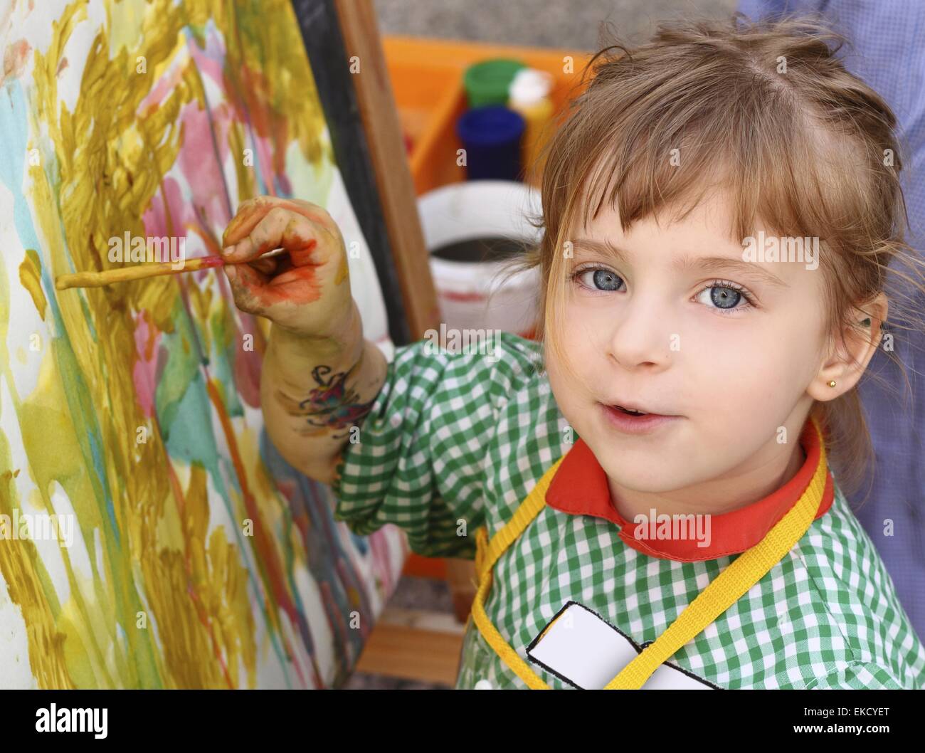 artist school little girl painting watercolors portrait Stock Photo - Alamy