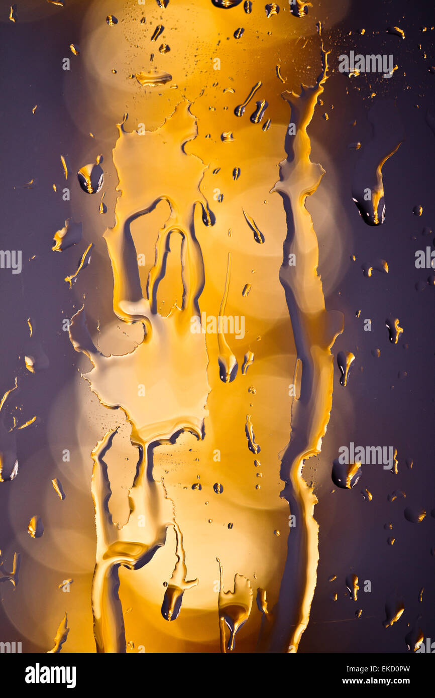 Drops of rain on window with bokeh lights abstract Stock Photo - Alamy