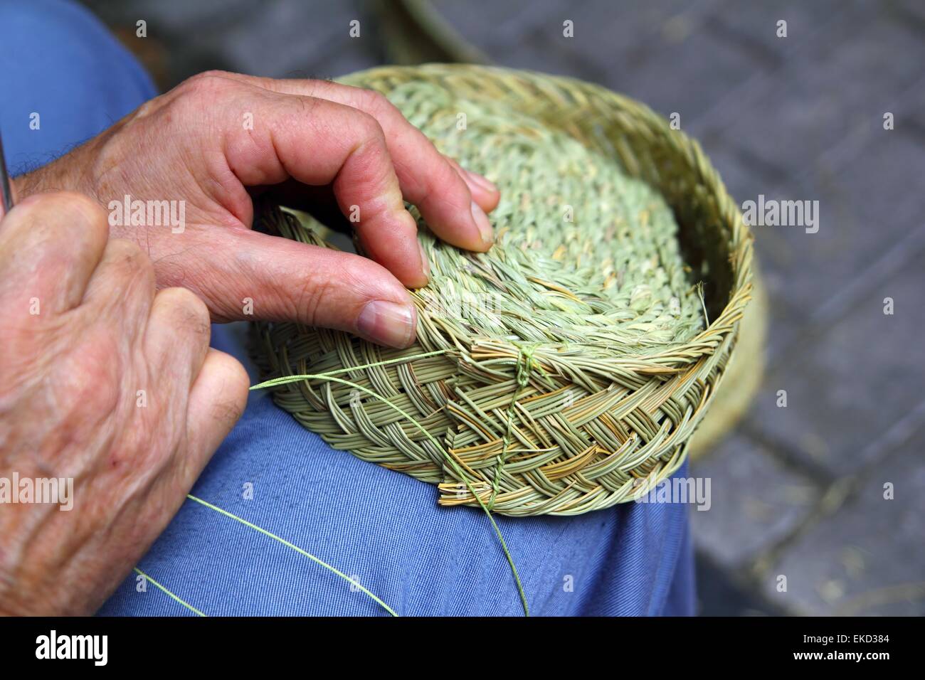 craftsman sewing basket esparto grass weaver Stock Photo Alamy