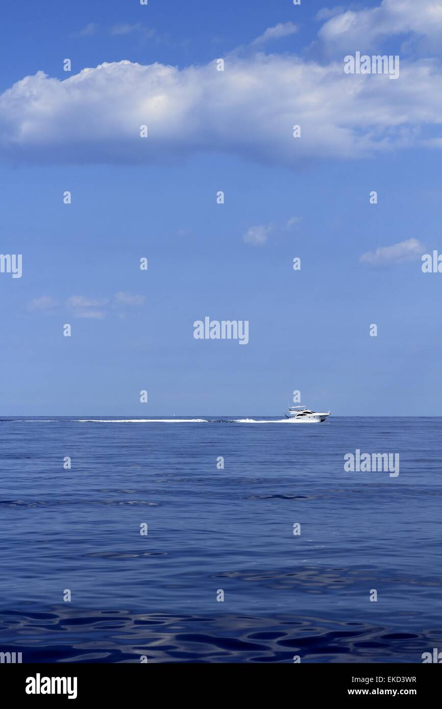 motorboat fisherboat cruising speed on blue sea Stock Photo - Alamy